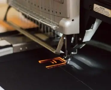 Broderie Lettre sur tissu en Algérie